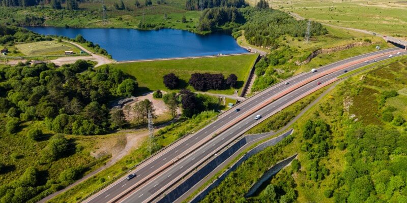 UK dual carriageway with lots of greenery around it