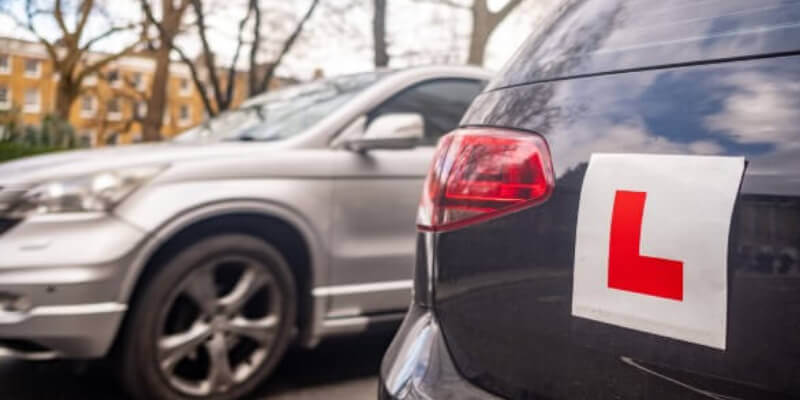 L-plate stuck on the back of a car