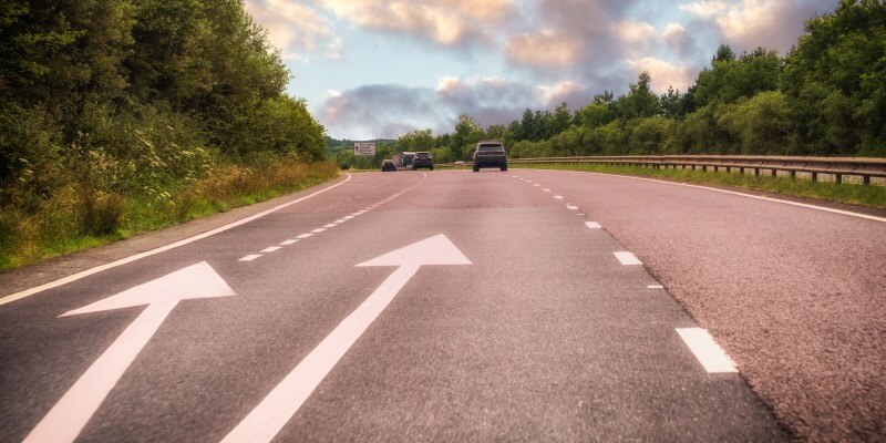 Dual carriageway with arrow markings on the floor to display the exit